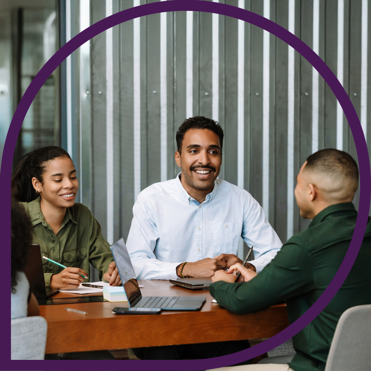 A group of employees engaging with one another