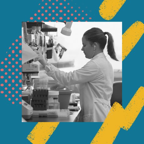 Woman wearing a white lab coat working in a laboratory