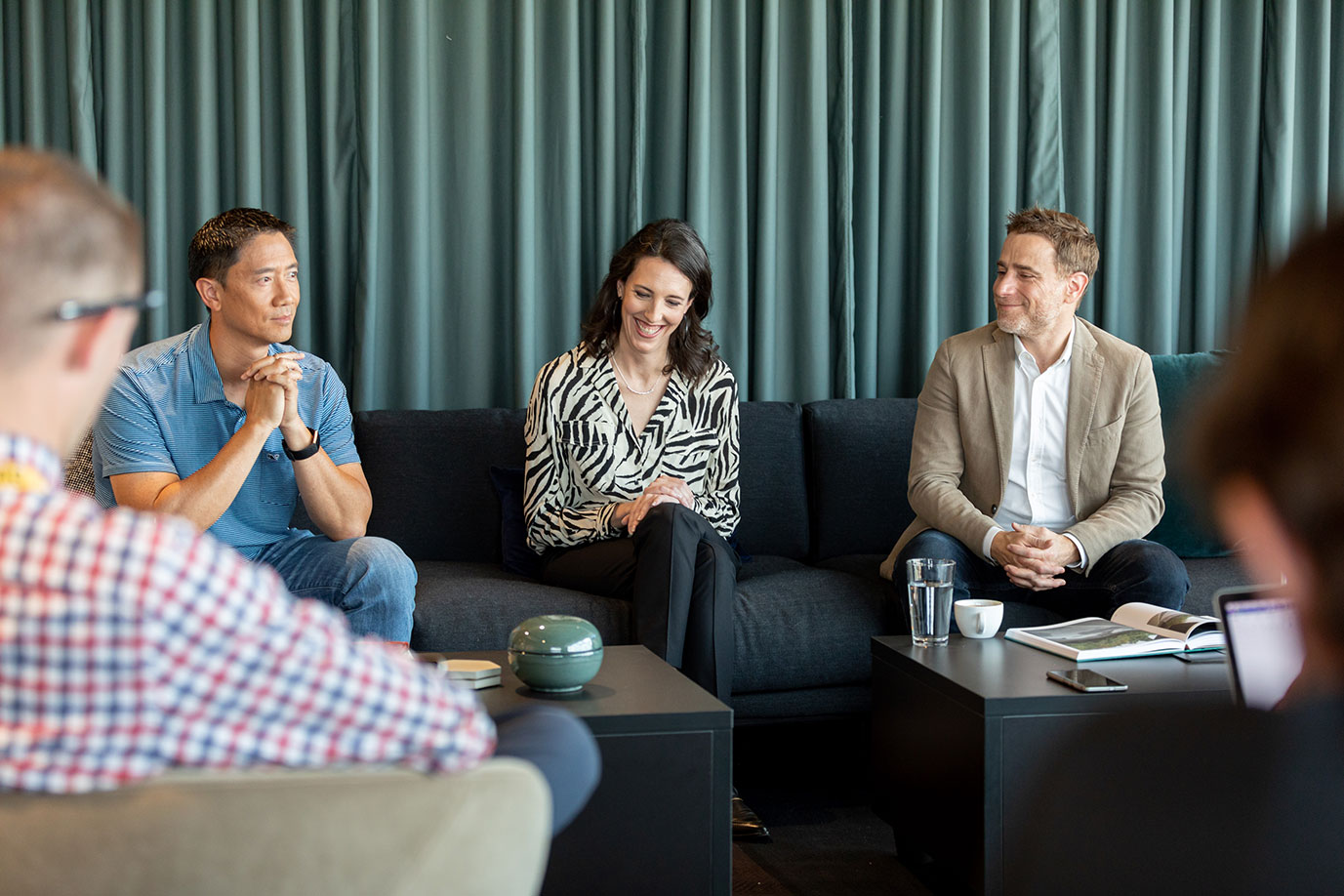 Slack executives (Robby Kwok, VP of People; Ali Rayl, VP customer experience; Stewart Butterfiled, CEO) at the opening of Slack's new office in Denver.