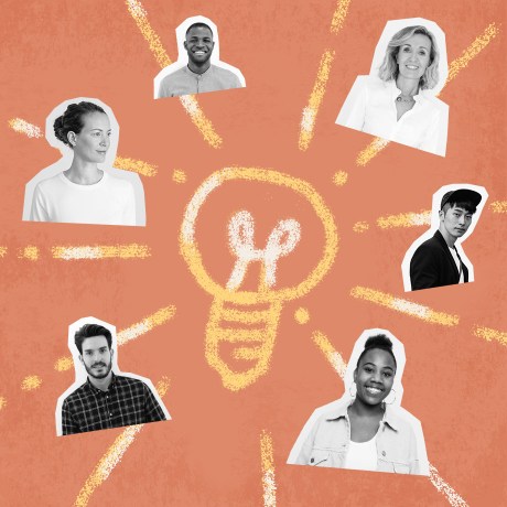 business solutions hero people surrounding a lightbulb
