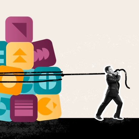 business technology hero man carrying building blocks behind him
