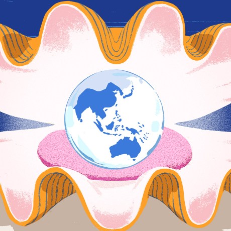An oyster opening up to show a globe in the form of a pearl